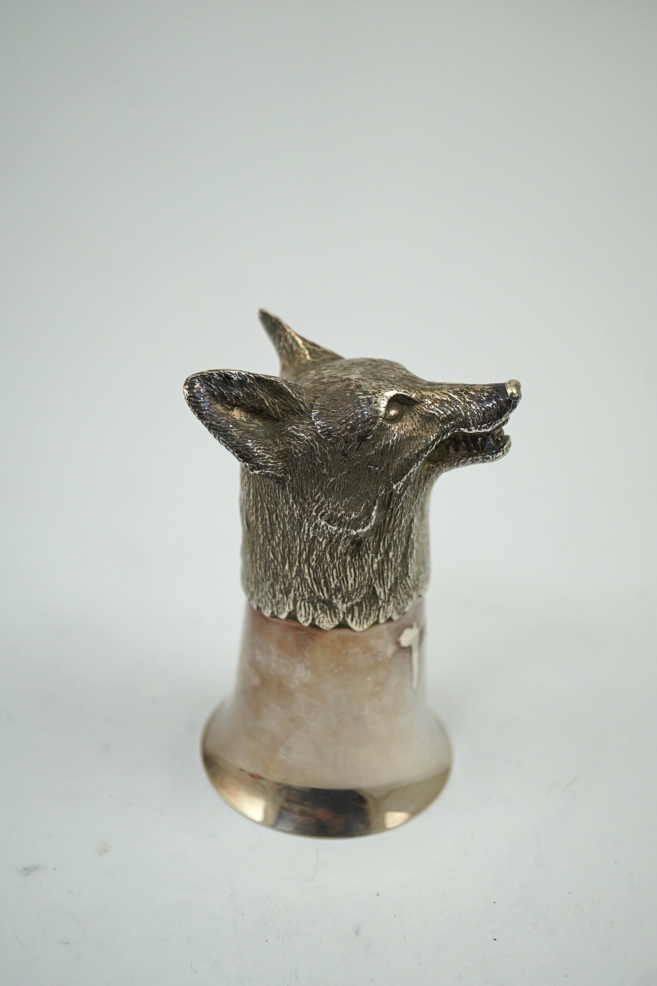 An Elizabeth II fox head stirrup cup, by Royal Irish Silver Company